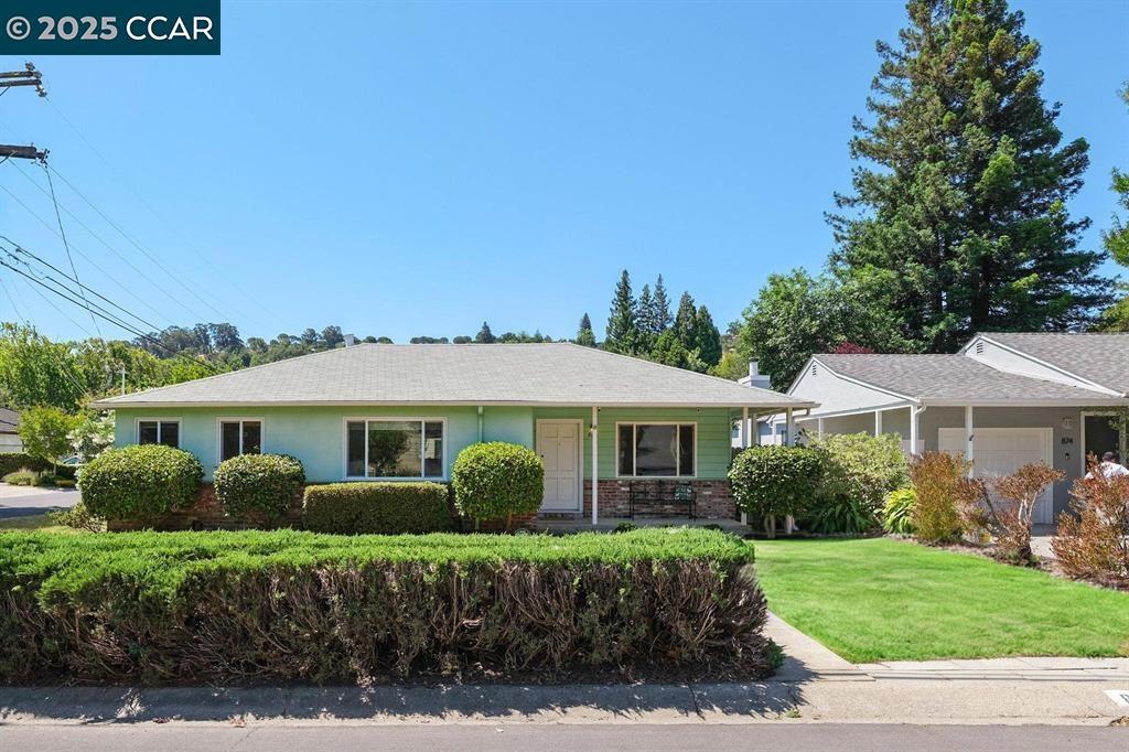 Excellent Schools! Amazing opportunity with tremendous upside potential in highly sought after Saranap. Large, level corner lot and a charming single level home in the heart of the prime, vibrant tree-lined neighborhood! This light filled ranch home features hardwood floors, 4 spacious bedrooms, 2 full bathrooms, bright open kitchen and inviting indoor/outdoor entertaining. Other amenities include dual pane windows, formal dining, updated lighting, and a spacious great room, with a cozy fireplace. The large, detached garage is big enough for 2 cars, large office or potential ADU. The lush and colorful backyard is full of fruit trees, beautiful roses and is prime for lawn, pool, garden or any type of landscape for home additions. This is a wonderful opportunity!
