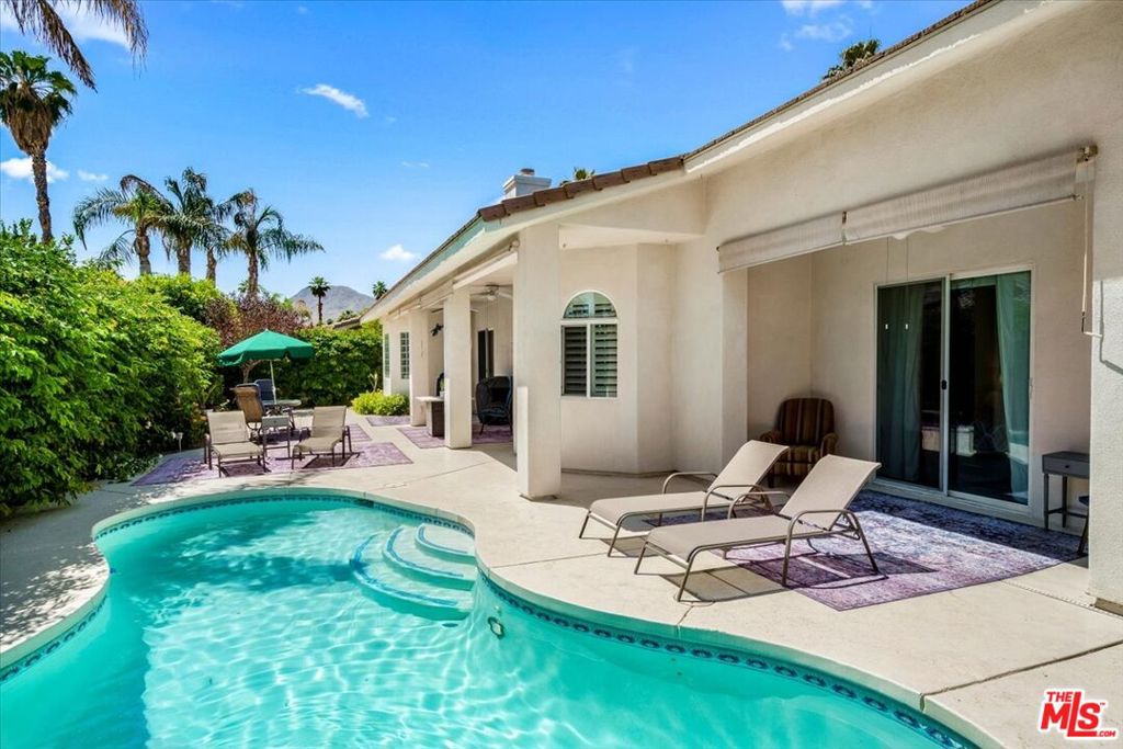 Welcome to Serenity Cove a fully furnished home available for 1 year lease minimum! Where sophistication meets comfort in one of the desert's most desirable gated enclaves. Perfectly situated at the crossroads of Cathedral City and Rancho Mirage, and just 15 minutes from downtown Palm Springs, this impeccably cared-for fully furnished residence available for lease offers a lifestyle of effortless elegance and privacy. Tucked away on a quiet cul-de-sac and set on a premium interior lot, this 3-bedroom + den, 3-bathroom home spans 2,416 square feet of thoughtfully designed living space. The open-concept great room with a cozy gas fireplace flows seamlessly into a chef's kitchen appointed with granite countertops, a walk-in pantry, and stainless steel appliances. For more formal affairs, a separate dining room is ready to host your next dinner party in style. With two generously sized primary suites and ideal bedroom separation, comfort and flexibility are built into the layout. The bathrooms are spa-inspired, complete with dual vanities, a soaking tub, and spacious walk-in closets. Warm wood flooring, plush upgraded carpeting in the bedrooms, and fresh designer paint make this home move-in ready. Step outside into your private resort like backyard that's truly an entertainer's dream. A sparkling pool and spa are surrounded by lush landscaping and multiple shaded patio areas perfect for lounging or hosting under the stars. Serenity Cove is calling!