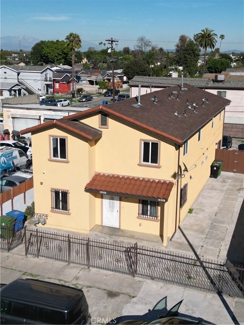 Photo of 10306 S Main Street #2, Los Angeles, CA 90003 (MLS # DW26055518)