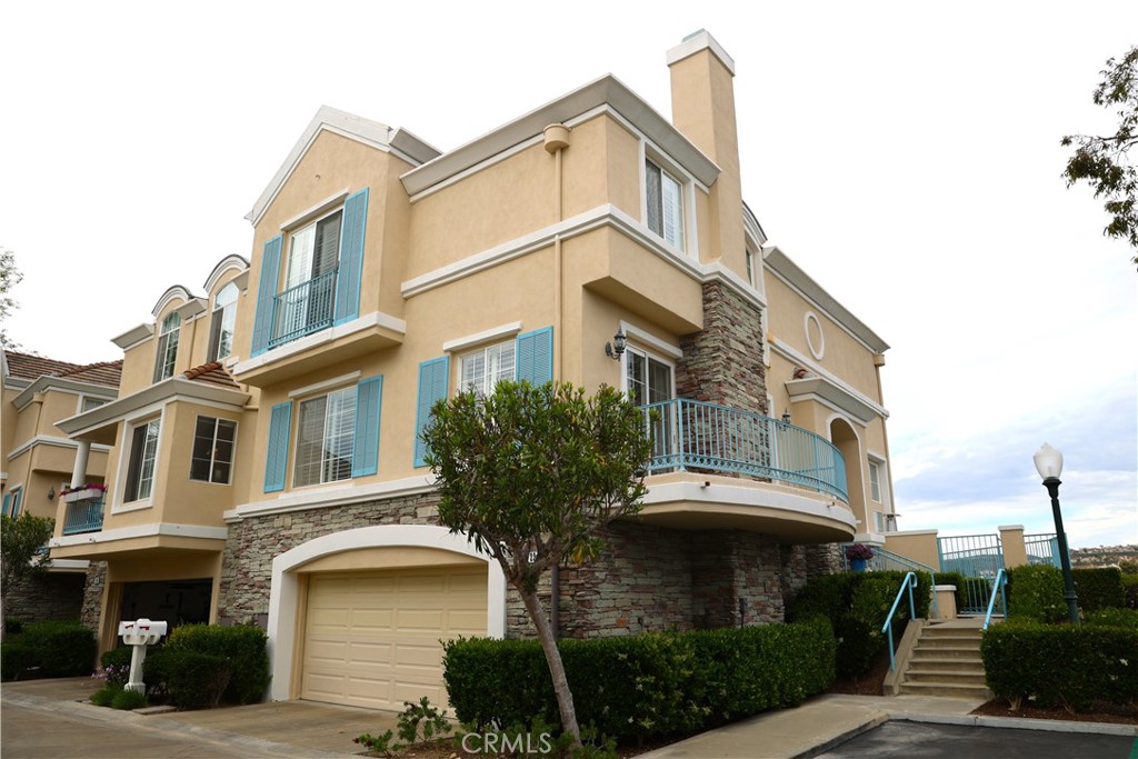 Gorgeous 180 Degree Panoramic Canyon Views! Peek-A-Boo Ocean Views! Sparkling City Lights Views! Gate-Guarded Community! Private Quiet End Unit! 3 Bedrooms plus Den/Office/2.5 Baths! 2400 SF! Lrg Entertainer's Livingroom w/Marble Fireplace & 2 Story Ceilings! Exquisite New Granite in Kitchen! Double Ovens & Pantry in this Gourmet Kitchen! Have Fresh Coffee in this inviting Breakfast Nook! Dramatic High Ceilings w/Transom Windows Inspire Formal Dining w/Awe Inspiring Sunset views! Big Den/Office - so many possibilities for this great room! Deluxe Master Suite w/Romantic Fireplace! Dress to the 9"s w/2 Walk-In Closets! Master Bath w/dbl sinks, Separate Shower & Tub for Two! Your Guest will be Impressed as they look at their Pelican Hill View! Both the 2nd & 3rd Bedroom are Good-Size! Inside Laundry! 2 Car Attached Garage w/Extra Storage on all 3 sides! Large Celebration Patio for BBQ's with Friends & Family! Association provides a Refreshing Pool & Relaxing Spa! Close to the Newport Coast Community Center, Parks, Shopping at Fashion Island & the Beach!!!