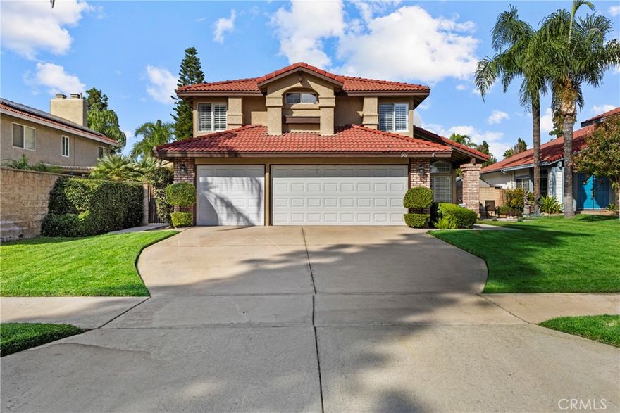 Skip the renovations — this home is already beautifully UPGRADED and completely MOVE-IN READY! Step through the Double Doors into a bright, open Floor Plan with Vaulted Ceilings, SHUTTERS, and LAMINATE Flooring. Celebrate special occasions in the open Family and Dining Room, or relax by the cozy fireplace in the Family Room that opens up to the beautifully REMODELED Kitchen. Your inner-Chef will enjoy all the Modern Conveniences of a Farmhouse Sink, in-island Microwave, 6-burner Stove, Hood, and plenty of storage — perfect for everyday living and entertaining. A DOWNSTAIRS BED and BATH add flexibility for Multi-Gen Living or a Home Office. UPSTAIRS, 2 Bedrooms share a convenient JACK-AND-JILL BATH, while the Primary SUITE offers another FIREPLACE, private BALCONY, spa-like Bathroom with Soaking Tub, Walk-In Shower, and DUAL CLOSETS with Organizers. There’s even an add’l Walk-In Closet with hidden Attic access for clever storage. The Backyard is built for Family and FUN — with an inviting space centered around a BBQ Island, Patio Cover with Fans/Lights, Outdoor Seating Areas, and Mounted TVs…it’s the perfect setting for Movie Nights or Sports Weekends. Sitting on a Generous LOT, the spacious Front and Back Yards offer charm and functionality with an abundance of Mature Landscaping and room to add a POOL. An attached 3-CAR GARAGE with Cabinets and a spacious Driveway provide plenty of Parking and Storage, making this home as practical as it is inviting. SAVE MONEY every month with 34 SOLAR Panels (PPA), Whole House Fan and NEW Oversized A/C unit. If you’re searching for a home that’s been lovingly cared for and ready to enjoy from Day 1…then this one is a MUST-SEE! Don’t miss this rare opportunity to own a beautiful home in a PRIME LOCATION near the University of Redlands, schools, shopping and everyday conveniences.
