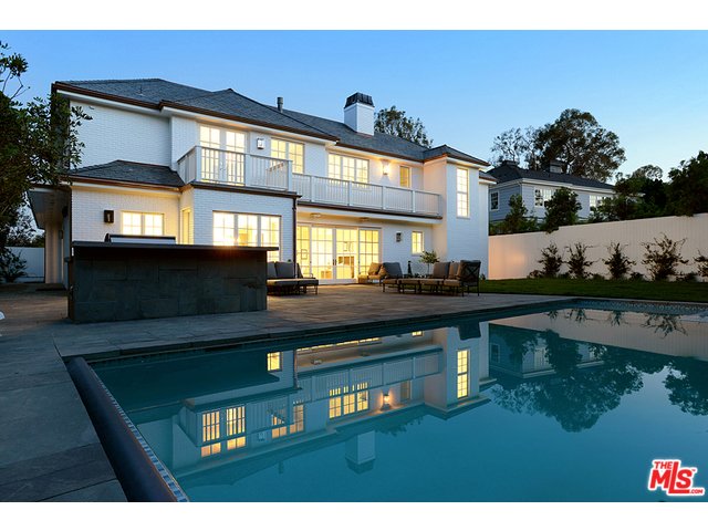 Stately New England White Brick Traditional, this brand-new exemplary estate is set on one of the most sought-after streets in the Riviera. Sleek design, minimalist elegance, and Mad Men disposition are the inherent qualities of this masterpiece. Extremely spacious 7 bed, 7 full baths and 2 half baths. This residence offers every amenity desirable: Tasteful rooms overlooking front and backyard, gracious kitchen, detailed bar on lower level, wine cellar, gym, theatre/media room, 2 laundry rooms, 3-car garage, and an expansive patio to capture the breathtaking swimming pool and spa. This estate has a very classic demeanor while demonstrating a contemporary and modern elegance. This is a luxury residence that must be experienced.