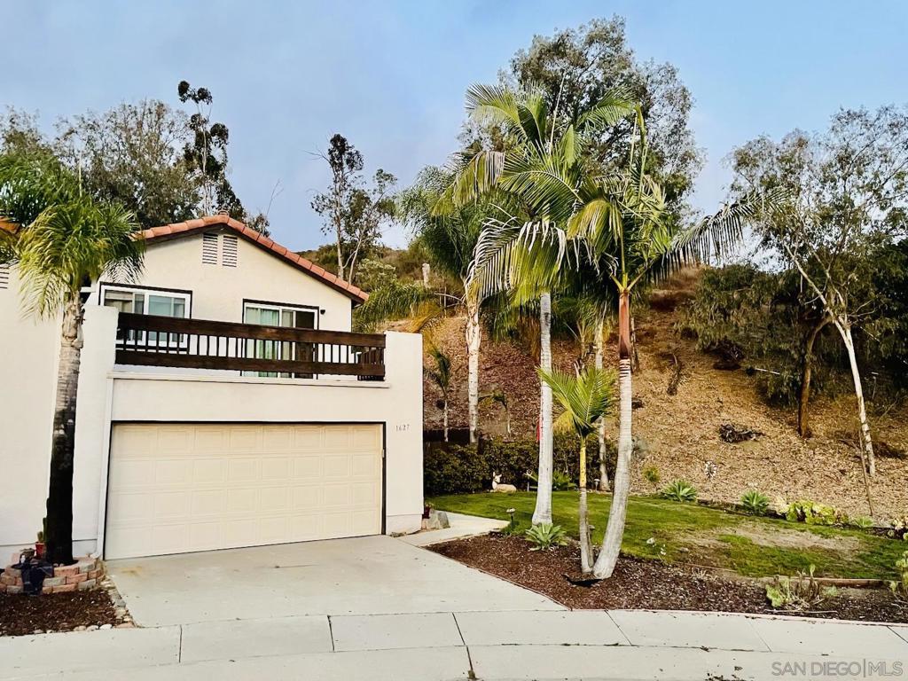 PICTURES COMING July 27th! Tucked away on a quiet cul-de-sac in Rancho San Diego, this beautifully updated twin home offers the perfect blend of privacy, space, and style! Sitting on an oversized lot adjacent to open space, you'll enjoy the luxury of outdoor space with no neighbors behind you. The expanded and remodeled kitchen is a true highlight, thoughtfully designed with both functionality and aesthetics in mind. The bathroom has also been newly upgraded with sleek finishes and modern touches. Vaulted ceilings and newer energy efficient windows fill the home with natural light while keeping it cool and comfortable. Relax in the spacious front yard and watch the sunset from your private second story balcony. The backyard is a dream, beautifully landscaped with turf for a clean and low maintenance space perfect for entertaining! With an attached two car garage, additional driveway parking, and plenty of street parking, you’ll never have to worry about space for guests. The garage also features an additional finished room that can be used as a workshop, game room, home gym, or extra storage. All of this in a prime Rancho San Diego location close to shopping, dining, parks, and schools. This one checks all the boxes and is ready to welcome you home!