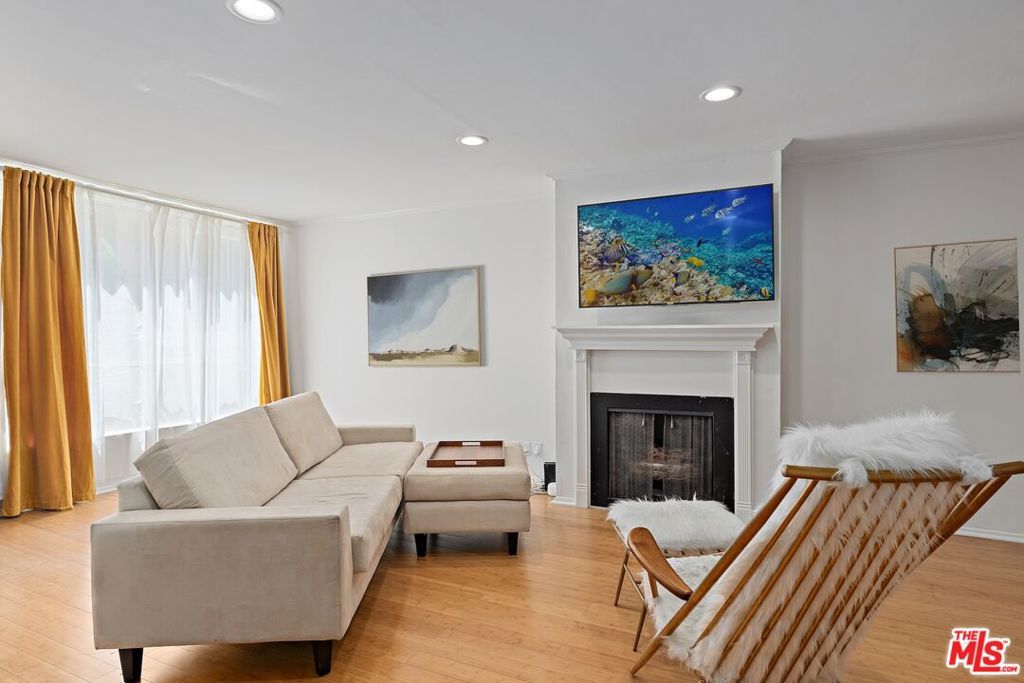 Photo of 1745 Camino Palmero Street #106, Los Angeles, CA 90046 (MLS # 25562141)