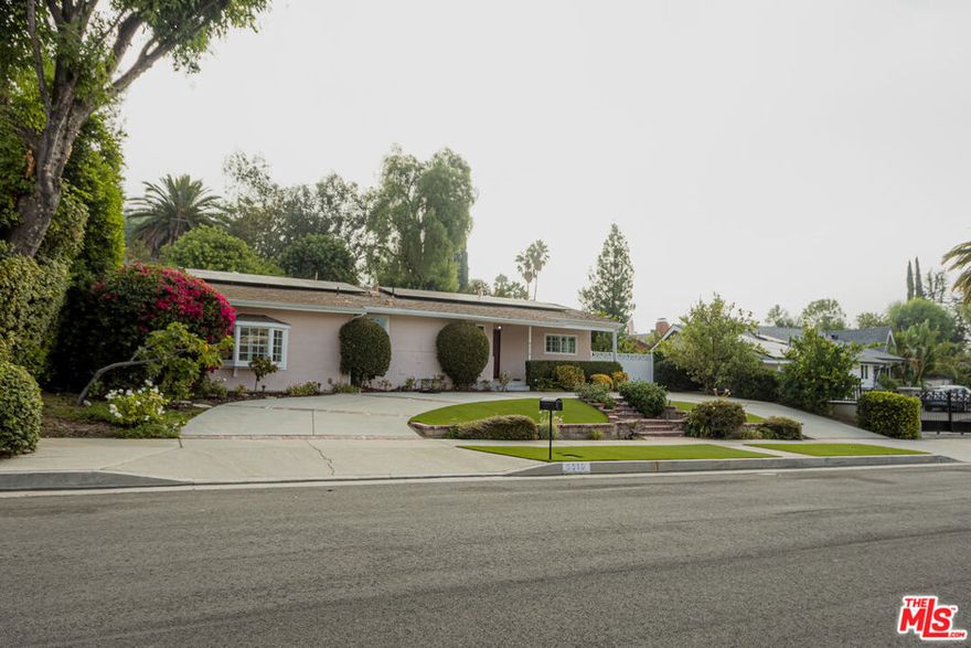 Welcome to 8510 Capistrano Ave  a beautifully updated four-bedroom home tucked away in one of West Hills' most desirable neighborhoods, known for its tree-lined streets, great schools, and friendly community atmosphere. Step through the front door and feel the natural light immediately fill the space. The main living room features elegant new wood-style floors, a large skylight, and a cozy dual gas-and-wood fireplace. Its classic wood-framed doors with multiple square glass windows and matching side panels let in soft light and open directly to the backyard, giving the room a bright, inviting, and timeless feel. Just off the entry, the first bedroom makes an ideal home office or guest room, freshly painted and full of natural light. The modern kitchen sits at the heart of the home with sleek white cabinetry, a professional six-burner range with dual ovens, stylish backsplash, dishwasher, and a large refrigerator. Beyond the kitchen, a second spacious living or dining area with tile floors, bright lighting, and another set of glass doors to the backyard offers the perfect space for family dinners or entertaining. To the left of the main living area, a hallway leads to two additional bedrooms and a beautifully updated full bath, all freshly painted in soft gray tones with plantation shutters and new finishes. At the back of the home, the primary suite is impressively large  a true retreat with generous space for a full sitting area or reading nook, multiple closets, and its own private access to the backyard. Step outside to a resort-style backyard designed for comfort and entertaining. Enjoy a recently renovated pool, a Jacuzzi spa, and a fully covered outdoor kitchen with a stove, barbecue, refrigerator, and large countertop  perfect for year-round gatherings. Just steps away, a beautifully finished standalone sauna offers a private, spa-like escape. The two-car garage includes a separate enclosed bonus room with its own private entrance, ideal for a workshop, studio, or hobby space. The yard also features fruit trees  pomegranate, orange, and grapefruit  providing fresh fruit and natural beauty throughout the seasons. The home is equipped with solar panels, adding energy efficiency and helping reduce utility costs. Bright, spacious, and full of character, this West Hills home perfectly combines timeless design, modern comfort, and resort-style outdoor living  offering the best of the California lifestyle in one of the Valley's most sought-after communities.