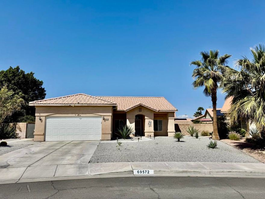 Beautifully remodeled home in the desirable neighborhood of Century Park! Home offers a light and bright open floor plan with 3 bedrooms, den and 2 baths. Newly renovated kitchen features white cabinetry, breakfast bar, pantry, quartz counter tops and newer appliances. Primary suite offers a large tiled walk in shower and dual vanity. Ceiling fans throughout. Living room features high ceiling and a tiled gas fireplace. Tiled flooring throughout.  2 car garage with new opener and storage racks. Additional features include; exterior gutters, newer furnace and Aqualink mobile app for the pool controls. Low maintenance Desert Landscape. Private backyard offers covered outdoor dining area, built in BBQ with a seating area, refreshing pool and spa. Walking distance to neighborhood park. Located close to shopping, restaurants, and freeway. No HOA fee!