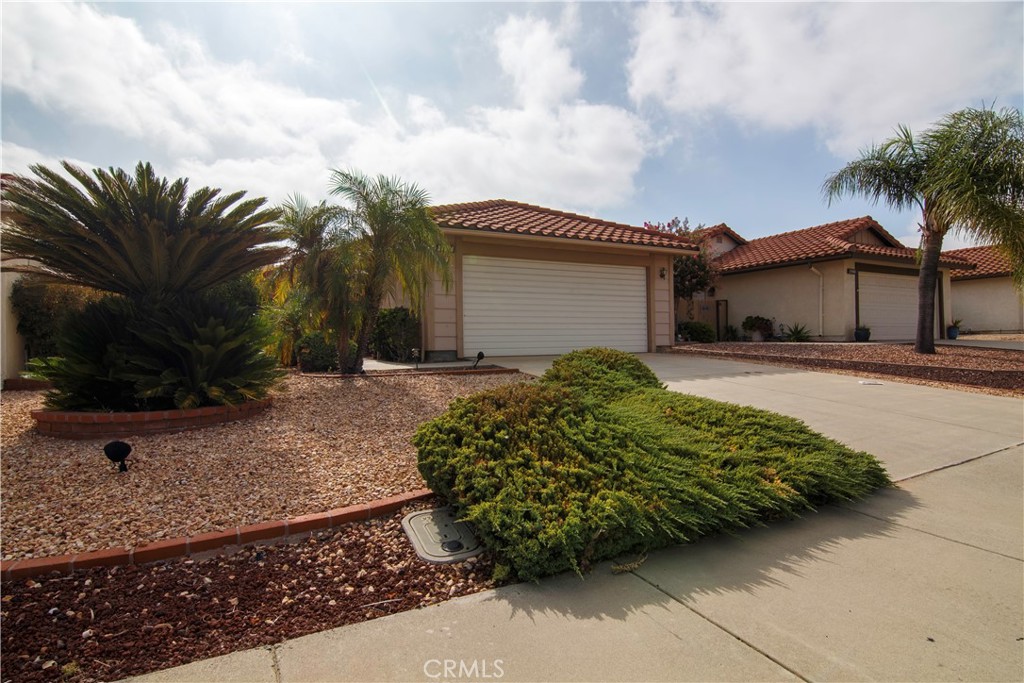 Welcome to your next chapter in the beautiful Sun City 55+ community of Menifee. This charming move-in ready single-story home features 2 bedrooms and 2 bathrooms, offering just the right amount of space for comfortable, low-maintenance living. Enjoy peaceful mornings in your backyard with stunning views of the San Jacinto Mountains, and spend your days just a short stroll from the community pool and clubhouse. Living in the widely-known Sun City community is perfect for staying active and social. Located in a quiet, friendly neighborhood with easy access to freeways and nearby parks, this home offers the ideal blend of relaxation, convenience, and community. Come see why life is better in Sun City!