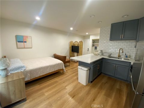 Photo of 827 S Manhattan Pl #205, Los Angeles, CA 90005 (MLS # PW26019324)