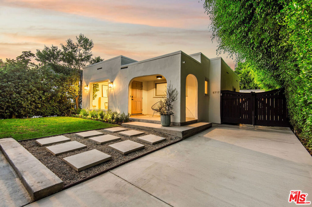 Discover unparalleled sophistication and convenience at 8717 Dorrington Ave, nestled south of Melrose in the prestigious West Hollywood West community. This recently renovated residence spans approx 1,800 sqft on a generous 4,800 sqft lot, featuring three bedrooms plus a detached flex space. Enter through a private, fully-enclosed gateway leading to a charming pathway and off street parking for four plus cars. The interior boasts an expansive open floor-plan, accentuated by a large picture window and skylights that floods the living spaces, enhancing the seamless flow between the family room, dining area, and outdoor spaces. The state of the art chefs kitchen is equipped with a dramatic backsplash, cascading island, and is perfect for entertaining and everyday living. The home's ambiance is enriched by all new european wide plank flooring, chic design elements and over $300,000 in recent upgrades. The primary suite offers a luxurious retreat, complete with a newly designed bathroom and ample closet space. Two additional bedrooms provide comfort and privacy for family and guests, while the detached bonus room is ideal for a home office, gym, or studio. The outdoor area has room for a pool and includes a private yard with mature landscaping, and multiple lounge areas perfect for relaxation and gatherings. Enjoy exceptional walkability with proximity to the trendy Melrose Design District, world-class shopping, restaurants, cafes, and located just minutes from Cedars-Siani and Beverly Hills.