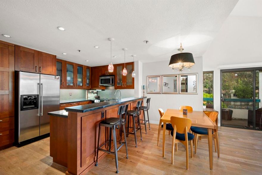 *Hidden Gem in the Heart of Tierrasanta!* Location, luxury, and lifestyle blend effortlessly in this beautiful top-floor corner unit, perfectly situated in Tierrasanta, San Diego’s Hidden Gem. This two-bedroom, two-bath condo has no shared walls, providing a peaceful and private retreat surrounded by lush greenery. The complex also has scenic views of the golf course. Step inside to discover vaulted ceilings, abundant natural light, and an open-concept living space accented by a cozy fireplace and a private balcony. The gourmet kitchen is designed to impress with rich cherry wood custom cabinetry, granite countertops, stainless steel appliances, a deep farmhouse sink, and elegant pendant lighting. The spacious primary suite boasts vaulted ceilings, a walk-in closet, and an extra mirrored closet, while both bedrooms have custom closets for optimal organization. Each bathroom has refined finishes, including sleek vanities and designer lighting. Additional amenities include in-unit laundry hookups and easy access to the elevator. Enjoy ample storage options, such as a private storage room off the balcony, extra storage in the second bedroom, and a dedicated storage locker next to the unit on the same floor. The home comes with one assigned parking space, plenty of guest and street parking, and the possibility to rent an additional assigned space through the HOA. Experience resort-style living with amenities like a sparkling pool, spa, and BBQ overlooking the golf course, tennis and pickleball courts, and a relaxing sauna. All of this is just moments from shopping, dining,  top-rated schools, and major freeways, yet nestled in a peaceful, park-like community. It’s a truly unique residence in one of San Diego’s most desirable neighborhoods. Come see for yourself why Tierrasanta is the Hidden Gem that locals never want to leave.