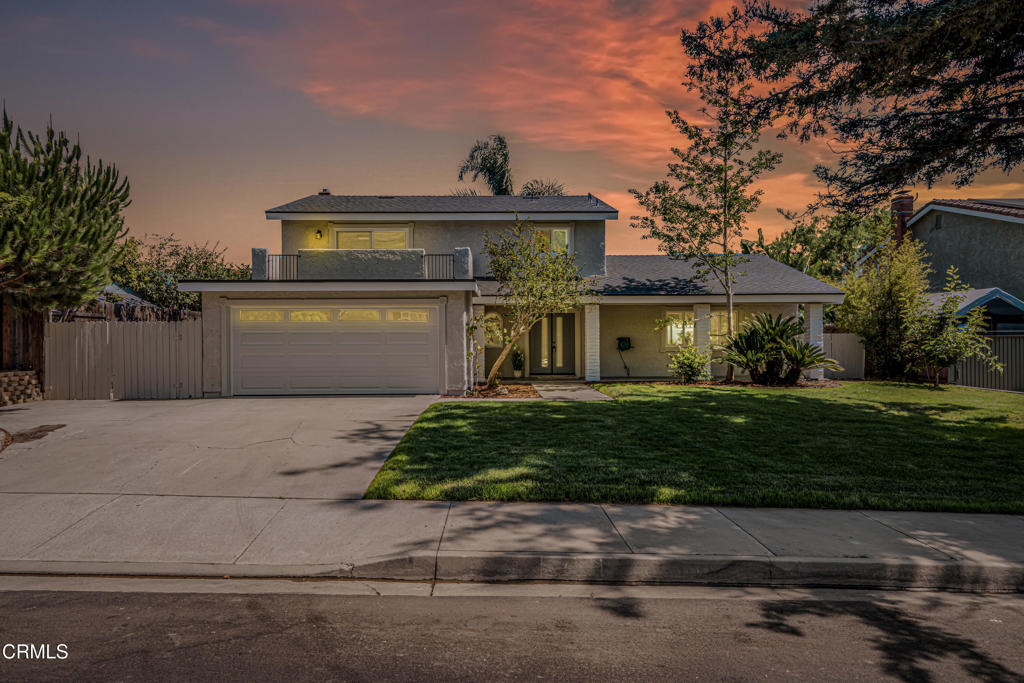 Nestled in the desirable city of Camarillo, this stunning two-story single-family residence offers 4 bedrooms, 3 bathrooms, and over a million reasons to call it home. From the moment you arrive, the double-door entry and soaring ceilings set the tone for an elegant and airy interior, enhanced by recessed lighting throughout.The formal dining area is a showpiece, featuring a centered, eye-catching chandelier and sliding glass doors that frame views of the spacious backyard. The updated kitchen is a chef's dream, showcasing marble countertops, modern cabinetry, a stylish backsplash, and a breakfast bar adorned with sleek pendant lights overlooking the inviting living room. A cozy family room with a warm fireplace and another set of sliding doors fills the space with natural light.The first floor also offers a well-appointed guest bathroom with a custom-tiled walk-in shower, a dedicated laundry room, and a generously sized bedroom perfect for guests or a home office. Upstairs, two additional bedrooms share a modern bathroom with a glass-enclosed walk-in shower. The expansive primary suite is a private sanctuary, complete with sliding doors leading to a serene balcony where you can savor your morning coffee while soaking in breathtaking mountain views. The suite also features a spacious walk-in closet and a luxurious en-suite bathroom with dual sinks and a beautifully tiled walk-in shower.This home has been thoughtfully upgraded with dual-pane windows and a new roof, offering both comfort and efficiency. The backyard is a true highlight, offering ample space for entertaining, mature fruit trees including coffee and banana, and unparalleled panoramic vistas that will make you fall in love with this property all over again.With a 2-car garage, refined finishes, and a location that balances tranquility with convenience, this Camarillo gem is ready to welcome its next chapter.