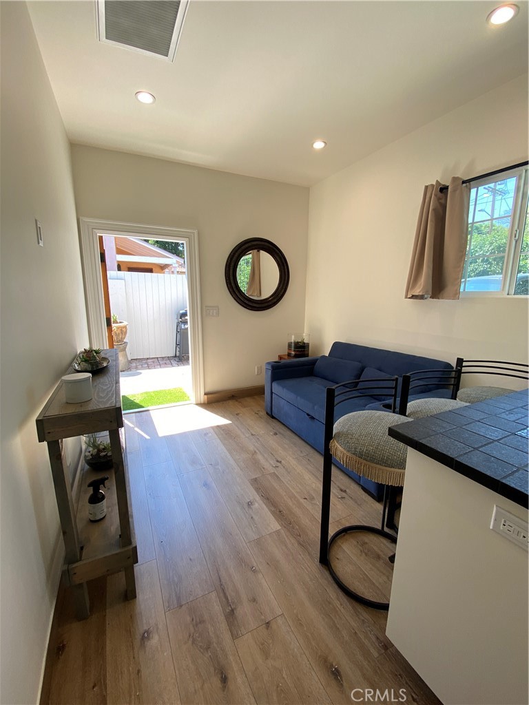 A newly built one-bedroom, one-bath ADU in the heart of Van Nuys is now available for lease. The unit is furnished for your convenience. It features wood-inspired flooring throughout, recessed lighting, stainless steel appliances (refrigerator, range hood, and stove), and a microwave. The bedroom features mirror closet doors and a new queen-size bed. The living room is furnished with a sofa and side table. T
Enjoy a beautiful spacious private patio already furnished with a water fountain, patio table and chair.
The owner pays for water. Tenant to pay for all other utilities.
One year lease required.
Street parking.
Move-in ready.
Furnished unit (ask for the list of items included)