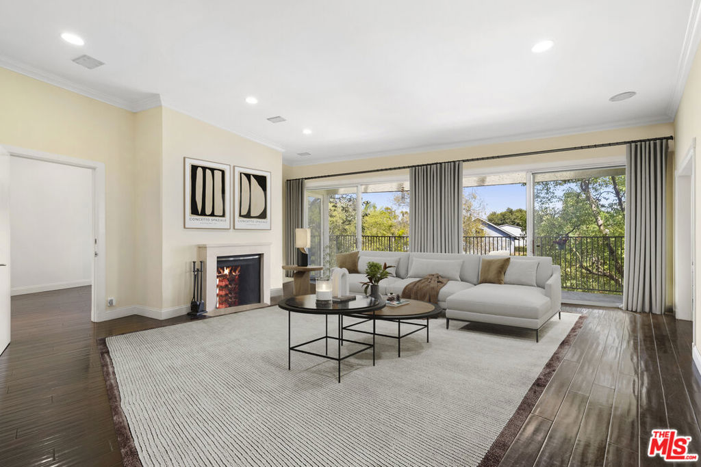 A rare fusion of single-family scale, condo ease, and all-day sunlight made for modern living and effortless entertaining. Unit 3D at 10600 Wilkins is the largest residence in the building (approx. 2,388 sq ft) with 5 bedrooms, 3 baths, a corner layout, and three balconies in prime Westwood near UCLA, Century City, and Beverly Hills. The third-floor setting showcases floor-to-ceiling windows, two primary suites, wood floors, recessed lighting, two fireplaces, and in-unit laundry. A chef's kitchen with stainless steel appliances and breakfast bar flows into a generous dining area, creating an easy everyday and entertaining rhythm. Enjoy a secure elevator building with video intercom, two covered parking spaces, and a pool; recent improvements include a resealed roof (10-yr warranty), resurfaced pool, and modernized elevators. Walk to UCLA campus, Hammer Museum, Geffen Playhouse, Regency Village Theatre, Westwood Village cafes (Diddy Riese, Broxton, Espresso Profeta), Trader Joe's, Ralphs, Sprouts, Target, and Westwood Park. Walk your kids to Fairburn Ave Elementary. A rare, move-in ready, 5-bed Westwood condo with dual primary suites, 3 balconies, pool, two parking spots and moments to everything in 90024.