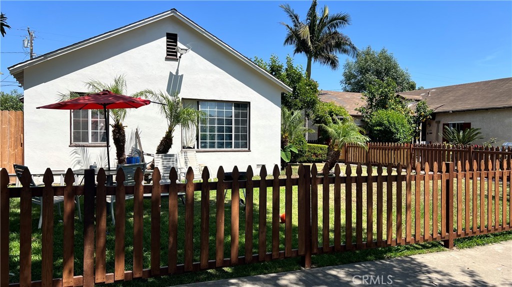 Excellent Investment Opportunity!! Located at 515 and 513 S Van Ness Ave, Santa Ana, a prime area with low vacancy, this beautiful, remodeled Duplex boasts 2 separate dwellings with their own utilities and amenities. Surrounded in a relatively quiet part of Santa Ana, the property bears a resemblance to the New England beach hut aesthetics of beautiful landscape, white paint, gray roof, and a porch. Each of the units comes with 3 Bedrooms and 1 Full Bathroom. The dark Vinyl oak flooring in the living room upon entry emits an air of warmth and coziness, making it an ideal living space for a small family. The kitchen in each unit features a stainless steel cooking range, microwave hood, white cabinets, and dishwasher to boot. Awash in natural sunlight from the double pane windows, each unit is its own living space with separate washer/dryer hookups, separate water heaters, separate car garages, and separate utility meters, Brand New Roof. There is also ample space for parking next to the garage and the alleyway nearby. Located in close proximity to the prestigious and historic neighborhood of Santa Ana, you will enjoy the benefits of urban living combined with a wealth of entertainment, dining, and a host of other cultural points of interest just minutes away. Don't miss this opportunity!!