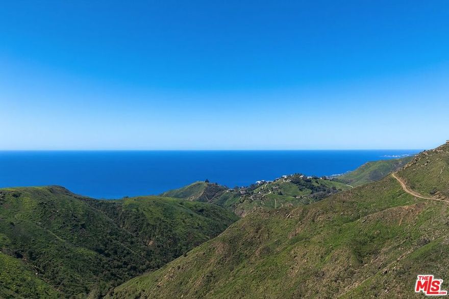 360 Canyon Views with Ocean Coastline on the Horizon. Visionary's Dream on Tuna Canyon. Seize a rare opportunity to craft architectural brilliance atop serene Tuna Canyon Road. Encompassing over three expansive acres, this pristine land offers sweeping 360-degree canyon views and a glimmering stretch of the Pacific coastline in the distance. This is a setting where nature's grandeur meets limitless creative potential. An impressive flat and usable building pad anchors the property, serving as a ready foundation for a statement home that blends seamlessly into the surrounding ridgelines. Whether you are a developer, designer, or private owner-builder, imagine a modern hillside retreat where panoramic canyon vistas and ocean breezes shape every corner of your living experience. Backed by valuable reports from 2006 including favorable geotechnical, soil, and percolation studies, the property is well-positioned for development. Original architectural and engineering plans outline a striking modern residence with ample room for lush gardens, water features, or a resort-style patio sanctuary. Tucked peacefully between Topanga and Malibu, this offering is more than just land. It is a canvas for legacy living where coastal beauty and canyon majesty elevate your vision of luxury. Build where the views never end and your dream home takes center stage in one of Southern California's most exclusive hillside enclaves.