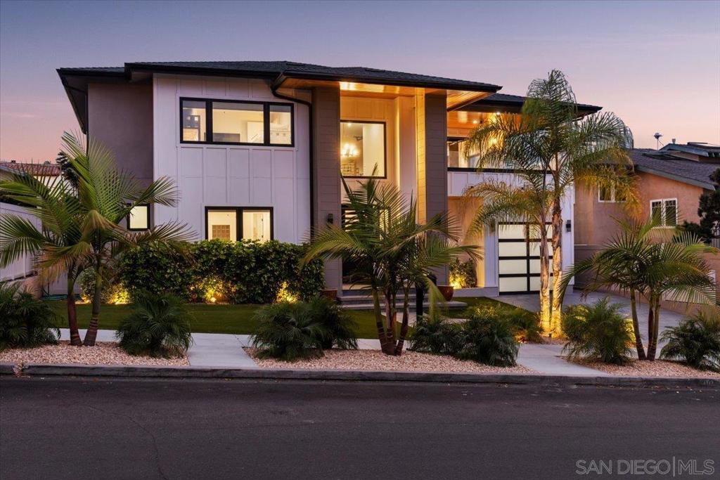 Experience unmatched coastal living in this stunning, fully rebuilt Sunset Cliffs home, showcasing panoramic ocean views from nearly every level. Reimagined from top to bottom and completed in 2021 with high-end custom finishes, this residence feels brand new — offering the ultimate blend of modern design and laid-back coastal style. Step into a bright, open-concept living space where the designer kitchen flows effortlessly into the dining and living areas, all framed by walls of glass that capture the endless horizon beyond. The sleek chef’s kitchen features Cleaf-finished cabinetry and luxury appliances, perfect for everyday living and entertaining. Designed for comfort and privacy, each of the four spacious bedrooms is its own suite with a private bathroom, ideal for family, guests, or working from home. The primary retreat is truly special, with a spa-like bath, generous walk-in closet, and ocean views to wake up to every morning. Enjoy seamless indoor-outdoor living with multiple covered decks, a private jacuzzi, and an expansive 725 sq. ft. rooftop deck with a full outdoor kitchen — the perfect spot to watch sunsets melt into the Pacific. Additional upgrades include 33 owned solar panels, a whole-house water filtration system, and a rare 3-car garage — all wrapped into a low-maintenance, move-in-ready coastal haven. This is your chance to own a modern masterpiece with million-dollar views in the heart of Sunset Cliffs — where every day feels like a vacation.