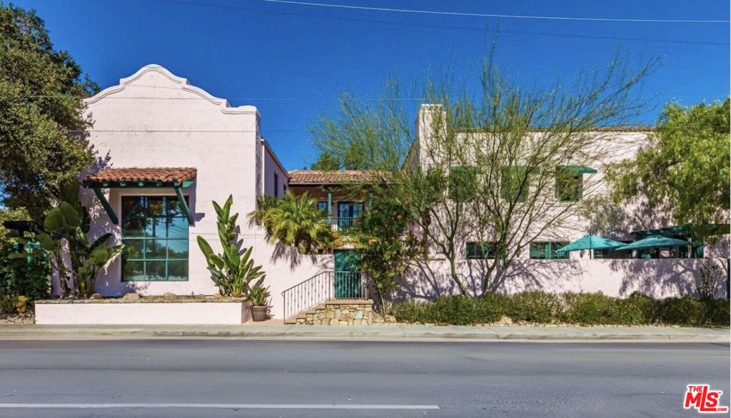 Located in the heart of downtown Ojai, this Spanish-style hacienda is in close proximity to Libbey Park, The Ojai Playhouse, Three Birds Cafe, Ojai Ice-cream & Highly Likely. Step inside, to an open layout connecting the custom kitchen with extra large island to the living and dining areas ideal for entertaining. French doors and high ceilings allow natural light to brighten space while leading to private outdoor space(s) that extend the living area(s). The primary suite features two separate closets, a fireplace, and its own balcony. A separate junior suite also includes a balcony, French doors, and wood-beamed ceilings. Highlights include two fireplaces, zoned HVAC, colorful Spanish tile, and a garage with builtins and a den-like feel perfect to host Sunday Funday while BBQ'ing outside or do your daily zoom calls. Additional home offices with separate entrances, Tesla charger included; other furnishings and features may be negotiable.