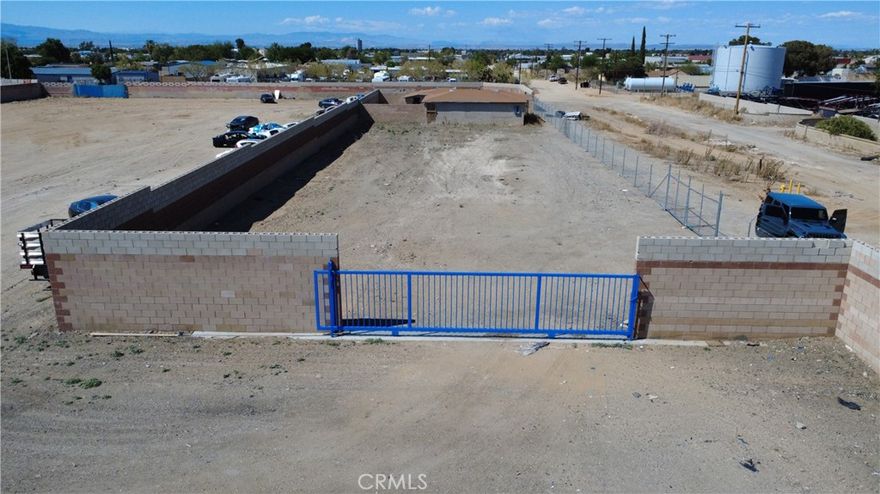 Incredible opportunity to own a 6-acre flat and fully fenced lot in Lancaster with Industrial Commercial zoning. This zoning typically allows for a wide range of industrial uses, including:

 • Warehousing

 • Manufacturing

 • Distribution centers

 • Trucking yards

 • Outdoor storage

 • And potentially other heavy commercial or industrial operations



Zoning allowances can vary, so it’s crucial that the buyer verifies directly with the City of Lancaster or Los Angeles County Planning Department to determine what is permitted on the parcel.

This expansive property offers a wide range of potential commercial and industrial uses. There is an existing structure on the lot (no bed/bath count), offering added value and utility for the right buyer or investor.



Endless possibilities—whether for storage, development, or commercial operations. Buyer to conduct their own due diligence regarding zoning, usage, and any building possibilities. Neither seller nor listing agent guarantees the accuracy of any information related to the property.