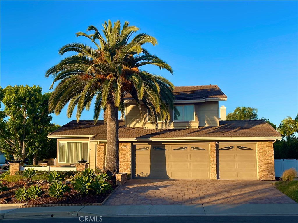 First showings Wednesday 8/6/25. Welcome Home to Coastal Elegance and Resort Living, in this beautifully updated family home, located on a wide corner lot with private backyard, surrounded by lush, mature landscaping, perfect for effortless entertaining around the large, saltwater lap pool and spa. Peek-a-boo Catalina views can be seen from the side yard that opens up to a private, wide and flat, cul-de-sac, which makes this location truly exceptional. This extraordinary home also has a spacious utility side yard, perfect for storing recreational equipment, SUPs and surfboards, or creating raised garden beds for your home grown organic produce. Also featured is a highly prized three-car garage for additional storage or home gym! Expansive ocean views can be enjoyed while seated at your front patio bistro, shaded by the mature date palm, inviting you to relax and unwind with your morning coffee or take in the full sunsets. The open floor plan is flooded with natural light. The updated interior living space boasts a remodeled kitchen with newer counters and cabinets, all new appliances, new window treatments, including remote-controlled Roman shades, and a new in-suite Primary bath featuring exquisite Carrara marble shower and floors setting off the designer-inspired gold fixtures, that offers a sophisticated touch to everyday living. This elegant home is equipped with new major upgrades include a new AC and furnace with new electrical and ducting, a new roof, new lush carpet in the upstairs bedrooms, new pool equipment including new electronic salt-water system and expansion joints, new custom paver driveway and new custom gates. The first floor bedroom and adjacent bath with walk-in shower is convenient for office or guests. The generous upper bedrooms offer ocean views from the South-facing view corridor. Nestled in the coveted Coast Community, you are a short distance to The Outlets of San Clemente, South County beaches with world-class surfing, and Avenida Del Mar, offering a variety of casual and fine dining, and boutique shopping. This remarkable home offers the best of South Orange County...coastal access and climate, excellent schools with an overall rating in 2025 by Niche of A+, serene surroundings and neighborhood, with the convenience of quick access to Interstate 5 and the 73 Toll Road. Hurry, this home won't last!