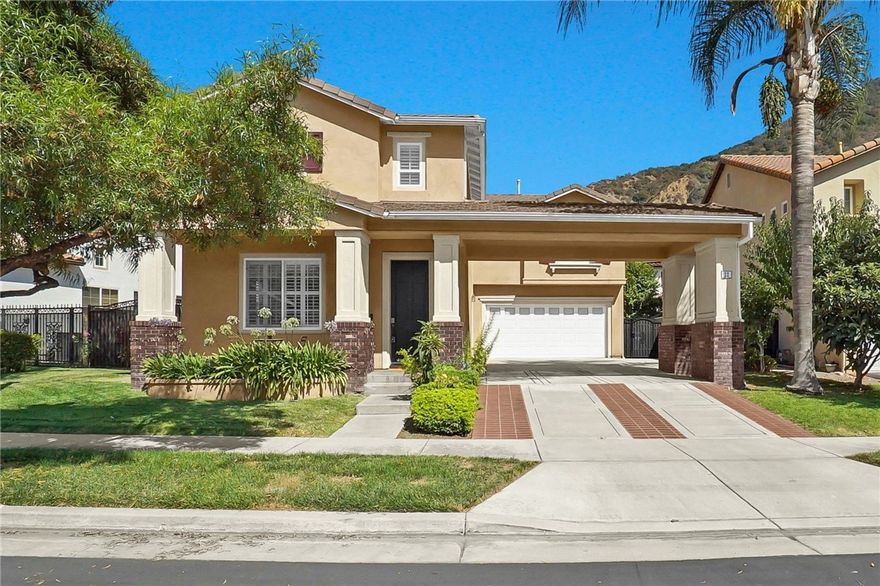 Welcome to luxury living in the highly coveted, gated community of Mountain Cove. Blending modern luxury with serene natural beauty, this home offers an unparalleled living experience where comfort, style, and community come together. 



This home features an open-concept layout that welcomes an abundance of natural light into every room, creating a warm and inviting atmosphere throughout. The gourmet kitchen, designed for both functionality and elegance with a spacious island. This property complemented by large picture windows adorned with custom plantation shutters.



The master suite offers a private retreat with a luxurious sunken soaking tub, dual vanities, and a large walk-in closet with custom organizers. Two additional spacious bedrooms, each with ceiling fans and custom closets, provide comfort for your family or guests. A versatile loft area upstairs can be used as a home office, media room, or even a potential 4th bedroom.



The garage is designed for versatile use. While it functions perfectly as a standard two-car garage, it can also be transformed into a mini movie theater, entertainment room, or man cave. It features two bicycles racks, ample cabinet storage, a dedicated workspace area. Carpet flooring has been added to enhance comfort and create a cozy atmosphere. Additional upgrade 240V outlet for electric vehicles charging. 



Living in Mountain Cove is more than just owning a home—it's a lifestyle. This private community is surrounded by breathtaking mountain views and offers direct access to walking and biking trails along the San Gabriel River. a rare outdoor amenity. Private community trails leading to scenic viewpoints overlooking the valley. More less, with exclusive resident-only holiday events, a Hawaiian luau festival, and 4th of July celebrations, Mountain Cove fosters a strong sense of community and connection.



The community boasts resort-style amenities, including a sparkling pool, spa, playground, and clubhouse, all just minutes from schools, parks, and shopping. Plus, with quick access to all the local stores, local dining, and universities, everything you need is right around the corner. This home offers a unique opportunity to experience luxury living in one of Southern California’s most sought-after neighborhoods. Whether you’re looking to entertain in style, enjoy nature, or simply relax in a beautifully appointed home.
