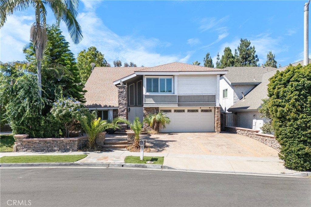 Opportunity knocks! Best deal in OC at ONLY **$450 Sq.Ft.** Especially in this prestigious neighborhood. MAIN floor bedroom.. Exceptional residence that perfectly blends modern luxury with timeless comfort in one of Lake Forest’s most desirable neighborhoods. Great curb appeal with custom flagstone. This beautifully appointed home offers refined living spaces, thoughtfully curated upgrades, and a serene setting designed for both relaxation and entertaining. Step inside to soaring ceilings, expansive windows, and an open-concept floor plan filled with natural light. The gourmet kitchen is a chef’s dream, featuring S&S appliances, sleek stone granite countertops, and a spacious peninsula, ideal for gatherings. Central A/C, double paned windows, custom stamped concrete in front and back. The inviting living and dining areas flow seamlessly to the private backyard oasis, where custom landscaping, fireplace, built in BBQ, gorgeous waterfall, and a covered patio create the ultimate setting for indoor-outdoor living. The oversized primary suite is a true retreat with a Sparkling fireplace, coffee bar, vaulted ceilings, offering a spa-inspired bathroom with dual vanities, a soaking roman tub, walk-in shower, and a large walk-in closet. Private balcony overlooking the park. Secondary bedrooms are equally well-appointed, perfect for family or guests, while the versatile loft or bonus space provides endless possibilities for a home office, media room, or gym. Located just moments from top-rated schools, scenic parks, shopping, and dining, this home combines elegance, comfort, and convenience. Whether hosting memorable gatherings or enjoying peaceful evenings. Rare opportunity to experience the best of Lake Forest living at an incredible price!! Hurry!!