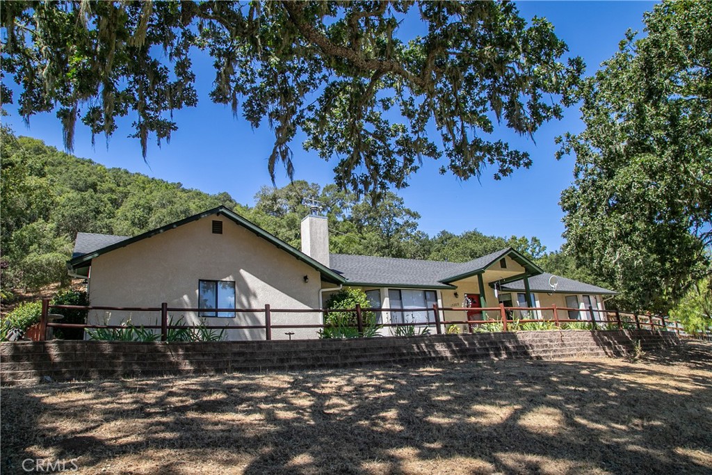 Coming home should always bring you comfort! This single level home and two acre property in the West Hills fulfills that in every way. A short, scenic drive from Atascadero brings you to your piece of paradise in a quiet area of wide open spaces and hillsides dotted with oaks. Drive up the paved driveway past easy care landscape and extra large parking area for guests, or toys! Pull into your large finished garage and savor the quiet. Breathe deep as you step into the calming home of your dream - open living space with high ceilings, filtered light from large windows, great views, topped off with a fireplace with insert! Think of all the wonderful gatherings you will host in the large adjoining dining room and cooks kitchen. Glass sliding door and large windows bring in the spacious yard and patio with a tiered seating area and more peaceful views. Three generous, light filled bedrooms, 2 large baths and separate laundry room all add to the atmosphere - no tight spaces here! Keep the open feeling with an incredible amount of storage in the garage attic and outside storage shed at the far end of the driveway. Just the right amount of usable space outside, the remainder of the 2 acre property is your own rolling hillside park, complete with an amazing array of deer and other wildlife. Relax knowing this property is easy maintenance, has been well cared for and has a BRAND NEW ROOF with 50 year warranty for new owner. Make the call - take that beautiful drive and place your offer to be the next fortunate owner of this home.