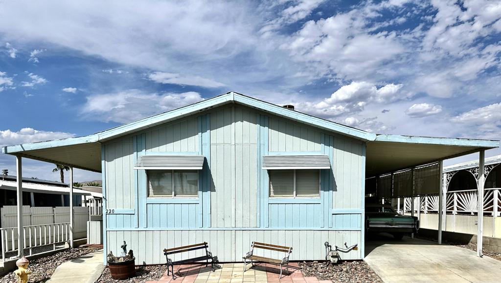 Move-In Ready! Spacious 2 Bed, 2 Bath Gem in Joshua Springs! This beautifully maintained, partially furnished home is ready for you to make your own. W/ ALL APPLIANCES INCLUDED, moving in has never been easier! The community offers LOW HOA FEE w/ incredible value covering services such as land tax, water, trash, sewer, high-speed internet, & cable! Step into a bright open space w/ cathedral ceilings & hard flooring throughout, perfect for entertaining family & friends this holiday season. Cozy up to the double-sided fireplace a perfect spot to unwind. The spacious kitchen is ideal for whipping up your favorite holiday meals. The home also offers comfort & convenience w/ the primary suite boasting a walk-in closet & full bath w/ both a stand-alone shower & large tub to soak in & relax. The 2nd bedroom is perfect for wanted & unwanted guests which opens to a versatile sunroom! The large laundry room offers additional workspace for all your projects! Home is equipped w/ central HVAC, updated double-pane windows, & exterior shed/workshop. Enjoy many of the community's amenities such as the renowned NATURAL HEALING MINERAL WATER pool & spa. Relish the benefits of living in a unique, self-governing community where residents are equal shareholders. The HOA is managed by the residents themselves, fostering a strong sense of community & connection. Don't miss this opportunity to own a beautiful home that truly shows pride in ownership! Caddy not included, but owner willing to sell!