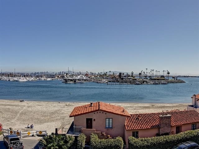 La Playa View Condo. The Third floor location offers panoramic views of the City, Bay, and Pacific Ocean and the building is across the street from a serene beach loved by locals, Kellogg's Beach. The unit has been updated and affords views from almost every room including living room, dining area, two bedrooms and the balcony. There is a walking path that takes you to the Village of Point Loma where you will find a number of restaurants, yacht clubs, and entertainment. Conveniently close to the airport.