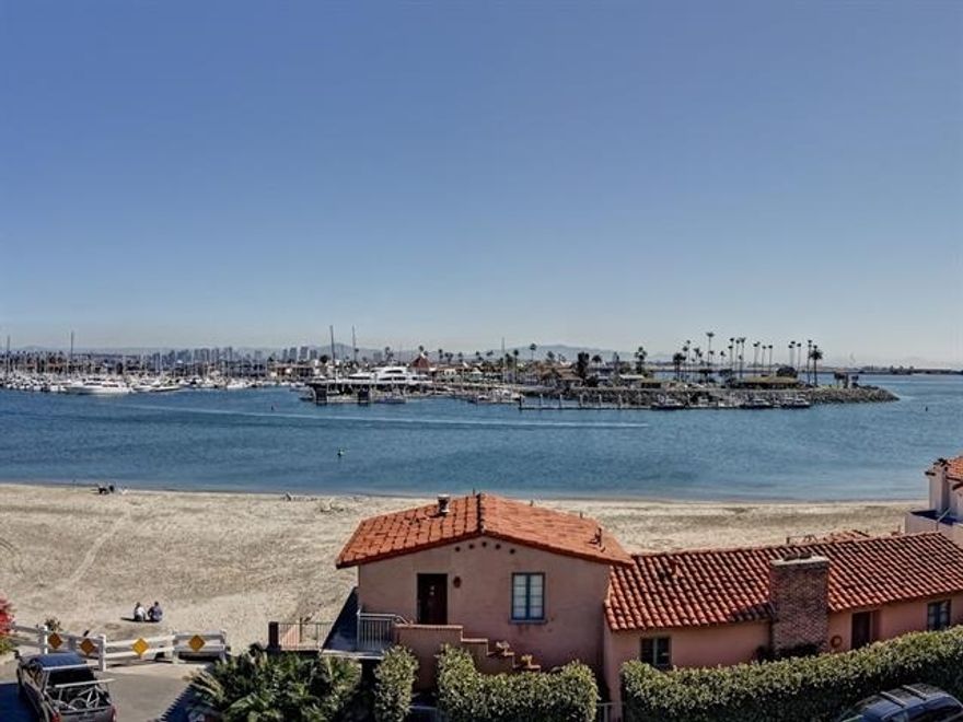 La Playa View Condo. The Third floor location offers panoramic views of the City, Bay, and Pacific Ocean and the building is across the street from a serene beach loved by locals, Kellogg's Beach. The unit has been updated and affords views from almost every room including living room, dining area, two bedrooms and the balcony. There is a walking path that takes you to the Village of Point Loma where you will find a number of restaurants, yacht clubs, and entertainment. Conveniently close to the airport.