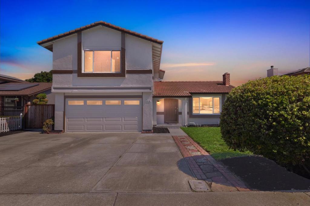 Freshly renovated inside and out, this 4-bedroom, 3-bath Union City gem is move-in ready! Upgrades include new laminate flooring, renovated bathrooms, and a modern kitchen with Quartz Countertops. The spacious family/kitchen combo and cozy fireplace make it perfect for gatherings. Step outside to a beautifully landscaped backyard with fruit trees and freshly poured concrete, ideal for entertaining. Situated on a 7,030 sq ft lot with garage parking, storage, and energy-efficient windows, this home offers comfort and style in the sought-after New Haven Unified School District.