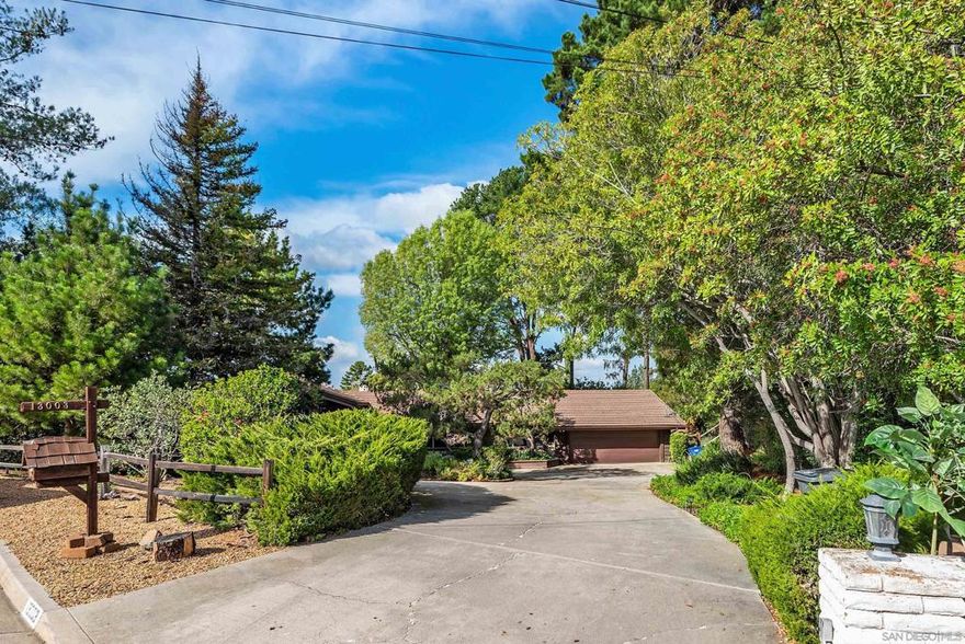 Welcome home to 13003 Corte Susana, where there is plenty of space both inside AND outside! Situated on over 3/4 of an acre, this home has it all.   This stunning tri-level home boasts great curb appeal and breathtaking views that will make you feel right at home. As you enter the main level, you will be greeted by the cozy family room featuring a large gas fireplace. The upstairs primary suite includes a private deck where you can enjoy fabulous views and unwind in tranquility, while the bottom level provides a separate bedroom and large bonus room that could easily be converted into a game room, den, guest room, or private In-Law Suite.   Step outside to an entertainers paradise! The backyard features a sparkling pool and covered patio, perfect for summer gatherings and lively get togethers. Wanted to get into gardening? There is plenty of space for that on this .77 acre lot that features plenty of flat space to enjoy! This property also features plenty of trees to provide shade and privacy.   With a great home layout and plenty of flat, usable outdoor space, this home is just waiting for the perfect person to make it their own!