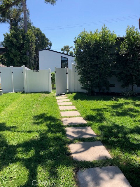 Rural Place is a gorgeous tree shaded street where you will step out of your parked car to the grass lined concrete pavers, catch your mail for the day and use your private locked gated entry into a spacious courtyard of artificial turf, colored pavers with manicured landscape that is accented by a lemon and rubber shade tree. Your vinyl fencing creates privacy with an actual complete fenced living space to enjoy the outside for that plentiful peaceful enjoyment of the Southern California vibe and weather. Back to basics we have you covered in any weather hot or cool with HVAC mini splits. Enter this home with a few steps prepped in bright RED that beautifully accent the black and white retro looking ADU rental home. Check out this never been lived in 2 bedroom - 1 bath (that is 3/4) - fully equipped electric kitchen with amazing counter space. Vinyl plank flooring, windows everywhere to allow light to brighten all the rooms with our California never ending SUNSHINE. Gardener paid for by owner 1 time per month. 8X7 Storage shed being set up by the end of the month for any storage needs you may have. We are a pet friendly home for a small pet.
