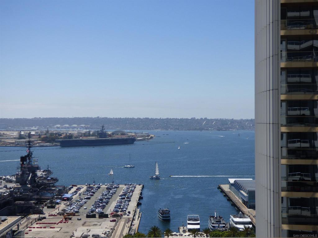Great views from this corner Unit location on the 22nd floor. Views of the Bay and City lights of downtown San Diego. Spacious floor plan with 2 bedrooms plus a third room which can be an office or bedroom. Views from a ample balcony with sit down views from all rooms. Primary bedroom has a large walk in closet