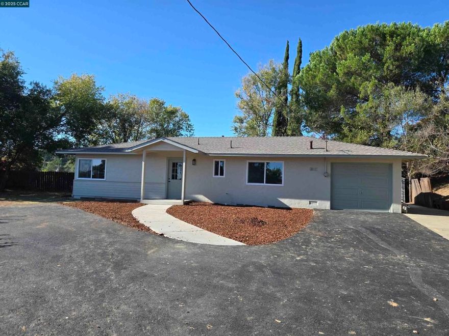 Absolutely Amazing 3 Bedroom and 2 Bathroom Home on a Private and Secluded lot with Mt Diablo Views. Designer kitchen and bathrooms with luxury features for comfort and ease of living. Kitchen has large island, upgraded wood cabinets, quartz counters and new stainless-steel appliances.  Primary suite bathroom has double sinks, tile shower and a walk-in closet. All bathrooms have tall vanities with lighted mirrors and easy clean surfaces. New roof, windows, flooring, copper pipes, sewer drains and fresh paint make this home move-in ready and worry free. The secluded lot offers plenty of off-street parking, RV parking, Views and room to add an ADU. Open Sunday 10/26 from 1-4pm