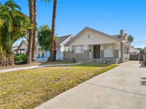 Photo of 5032 S Wilton Place, Los Angeles, CA 90062 (MLS # OC26180058)