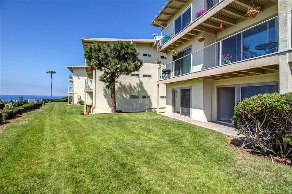 Recently renovated, bottom floor, walk out ocean view condo with huge patio/greenbelt right in front. Everything brand new, new cabinets, new tile floor, new appliances, new bath tub, new dual head shower, new granite, new lights. Light and bright, open kitchne with ovean view. All new. Complex includes large greenbelt area and pool/spa. Parking for 2 cars, one assigned carport, 2nd in reserved space. In unit washer/dryer. Available now. Available June 15, 2025.