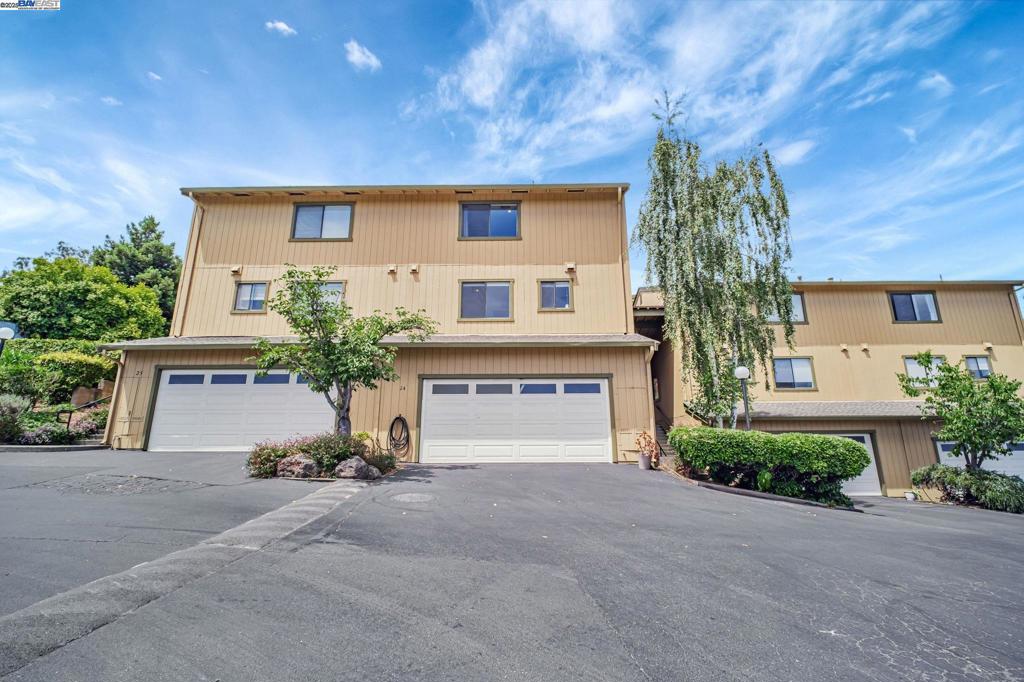 Welcome to this beautifully updated 2-bedroom, 2.5-bath corner townhouse with sweeping views of Castro Valley. This is the largest 2-bedroom floor plan in the community, offering over 1,600 sq ft of inviting living space. Inside, you’ll notice the abundance of sunlight and open feel throughout. The eat-in kitchen features granite countertops, a glass tile backsplash, farmhouse sink, and a generous pantry—perfect for home chefs. A separate formal dining room offers a great space for entertaining. The cozy living room includes a gas fireplace and opens to a private patio with easy access to the community pool. Upstairs, the oversized primary suite offers ample closet space and a stylish modern bath. The second bedroom is also impressive with its own private balcony overlooking lush landscaping. Additional highlights include a side-by-side two-car garage, plus access to the community’s pool, clubhouse, and sauna. Located in the top-rated Castro Valley school district, and just minutes from BART, Lake Chabot, shopping, and dining. Open house Sat (7/19) & Sun (7/20) from 2pm - 4pm.