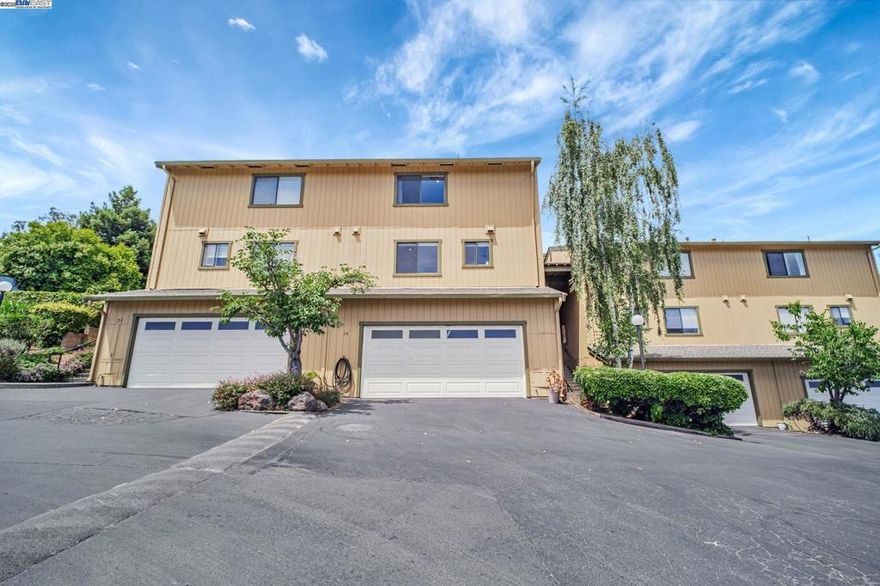 Welcome to this beautifully updated 2-bedroom, 2.5-bath corner townhouse with sweeping views of Castro Valley. This is the largest 2-bedroom floor plan in the community, offering over 1,600 sq ft of inviting living space. Inside, you’ll notice the abundance of sunlight and open feel throughout. The eat-in kitchen features granite countertops, a glass tile backsplash, farmhouse sink, and a generous pantry—perfect for home chefs. A separate formal dining room offers a great space for entertaining. The cozy living room includes a gas fireplace and opens to a private patio with easy access to the community pool. Upstairs, the oversized primary suite offers ample closet space and a stylish modern bath. The second bedroom is also impressive with its own private balcony overlooking lush landscaping. Additional highlights include a side-by-side two-car garage, plus access to the community’s pool, clubhouse, and sauna. Located in the top-rated Castro Valley school district, and just minutes from BART, Lake Chabot, shopping, and dining.  Open house Sat (8/30) & Sun (8/31) from 2pm - 4pm.