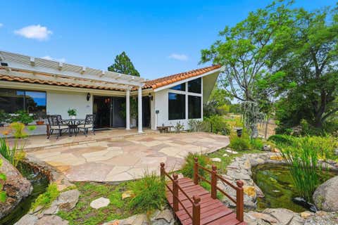 Photo of 10649 Meadow Glen Way E WAY, Escondido, CA 92026 (MLS # 260018779SD)