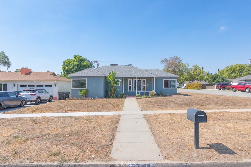 This spacious single-story home in San Bernardino with approximately 1,709 square feet of living space on a generous 9,600 square foot corner lot. The property features three bedrooms, two bathrooms, and a detached two-car garage with an additional bonus room that can serve as a home office, gym, or hobby space. Recent upgrades provide peace of mind, including a newer roof and windows, updated piping and gas line within the last couple years, and a newer water heater. Inside, the home is filled with natural light and centered around a cozy fireplace in the living room, creating a warm and inviting atmosphere. The expansive backyard offers ample space for entertaining, gardening, or future possibilities. Conveniently located near the 210 Freeway, this home combines size, updates, and value in a desirable neighborhood setting.
