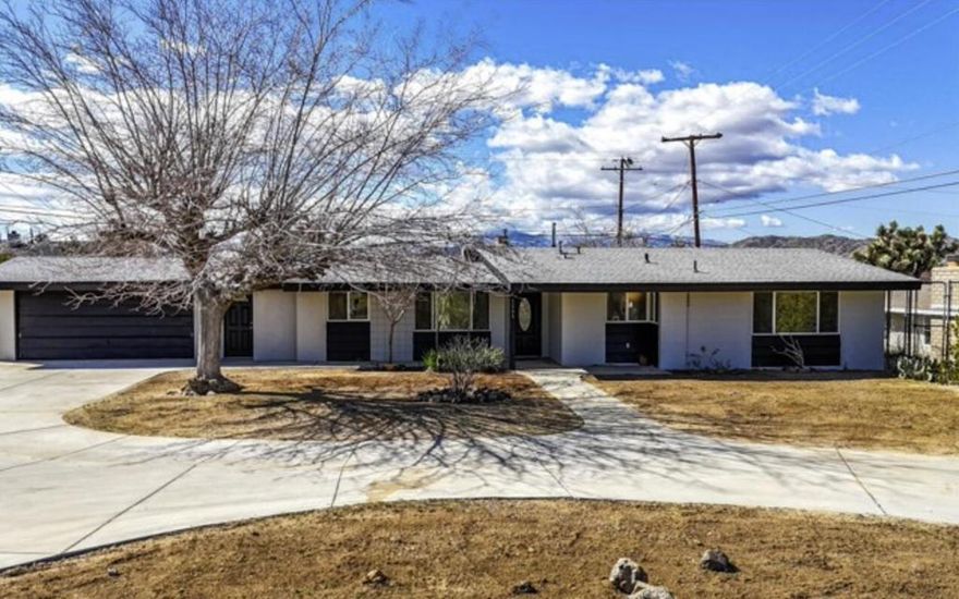 High Desert living at one of its finest! This late 1950's home offers the perfect mix of desert and city life living. Situated in the heart of Yucca Valley, you'll find the iconic Joshua Tree is minutes away offering vibrant art, music, entertainment, farmers market, etc.The home features spacious 3 bedrooms with 2 bathrooms, upgraded flooring and paint, formal dining room space, fireplace, 2 car garage and a sizable backyard. The backyard faces West so prepare yourself for remarkable mountain views and sunsets!
