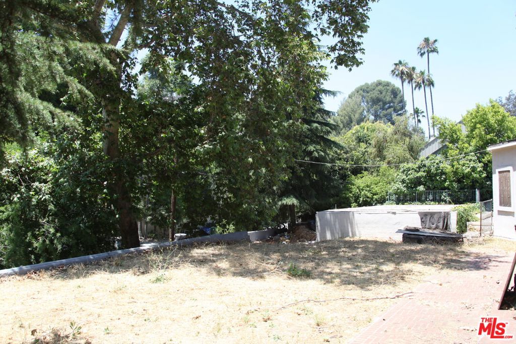 LOCATION!!!! LOCATION!!!!! LOCATION !!!!! Prime Beverly Hills Development Opportunity 0.69 Acre LotAn unparalleled opportunity awaits in one of the most prestigious neighborhoods in the world. Nestled in the heart of Beverly Hills, just minutes from iconic landmarks like Rodeo Drive and the Beverly Hills Hotel, this exceptional 0.69-acre lot presents the perfect canvas to build your dream estate or develop a luxury residence for resale.Surrounded by multimillion-dollar homes and celebrity neighbors, this property sits on one of the most beautiful and sought-after drives in Beverly Hills. Whether you're an investor seeking a high-value development opportunity or an end-user envisioning a custom masterpiece, this is a once-in-a-lifetime chance to own a piece of real estate in a location that defines world-class living.Don't miss this rare chance to create something extraordinary in one of the most exclusive pockets of Beverly Hills.
