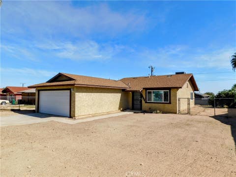 Photo of 5415 Cahuilla, 29 Palms, CA 92277 (MLS # JT26134649)