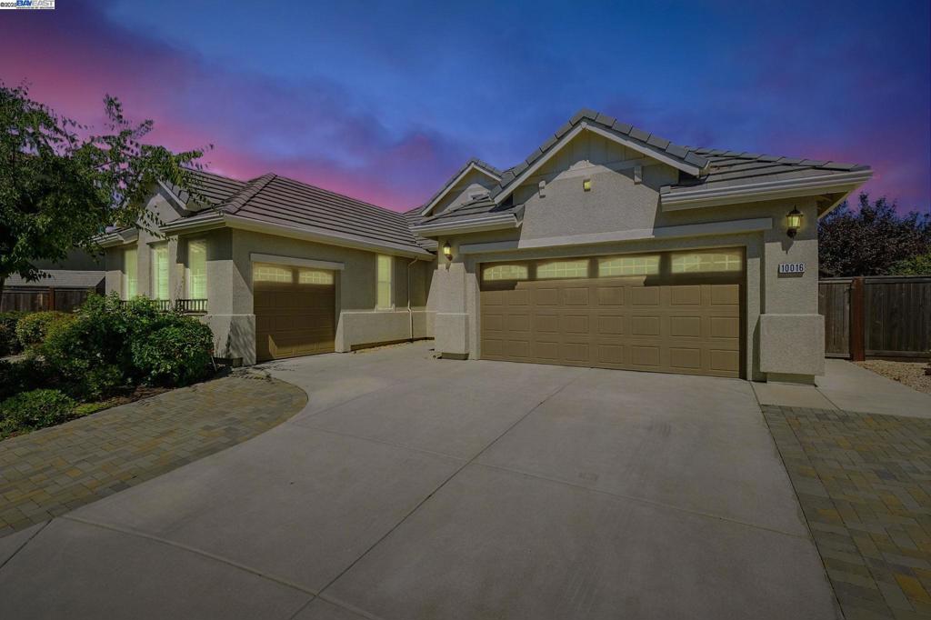 This home is a true gem! Upgrades galore! 3 bedrooms + bonus room (4th bedroom), 3 full baths and 3 car garage, situated in a pie shaped 12,345 sq ft lot.This stunning one-story home embraces contemporary living with its open floor plan, natural lights floods through oversized windows and glass sliding doors, creating a seamless connection between the indoor and outdoor spaces. Main living area flows effortlessly from the gourmet kitchen with oversized island to the spacious dining and expansive living room with remote controlled window coverings. Shutter window coverings through-out, Laminated floors, pre-wired for solar, internet, elec cars .The private bedrooms offer good sized rooms, including a primary suite with direct access to the backyard. Step out to the true backyard oasis. A lush, landscape retreat centered around a sparkling pool with waterfall feature and built-in-spa. The surround patio includes an oversized remote controlled awning, lounging areas shaded by matured trees and accented with natural stones.This large and lovely backyard is both peaceful and functional- a perfect extension of the home's indoor serenity. Its own gazebo is perfect for relaxation, BBQ, and has its own kitchenette and full bathroom. Create lasting memories in this beautiful family home.