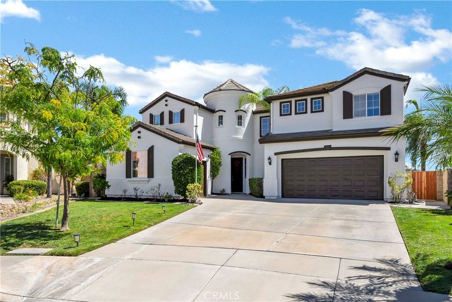 This stunning Rancho Bella Vista Pool Home awaits you! This beautifully remodeled 3,468 Sq. Ft. residence, cul-de-sac, corner lot exudes sophistication with striking curb appeal, fresh exterior paint, and high-end upgrades throughout. From the moment you arrive, you’ll notice the attention to detail and timeless designer finishes that make this home truly stand out! Step inside and be welcomed by a dramatic two-story entry showcasing an oversized chandelier, custom wainscoting, picture-frame molding, and a striking stone fireplace. The chef-inspired kitchen is the centerpiece of the home, featuring a massive quartz island, quartz backsplash, sleek new cabinetry, pot filler, wine fridge, double ovens, under-cabinet lighting, and a walk-in pantry, perfect for entertaining or everyday living. A refined downstairs office with custom French doors and an adjacent full-bath offers versatility and the ideal setup for multi-generational living or a private guest suite. Upstairs, retreat to the expansive primary suite with mirrored closet doors, a double-sided walk-in closet, and a spa-like bath with dual vanities, soaking tub, and separate shower. The suite opens to the impressive 100 Ft. full-length deck, perfect for morning coffee or sunset gatherings. A versatile loft/playroom also opens to the deck, capturing sweeping views with no rear neighbors. A graceful spiral staircase connects the upper deck to the pool level, creating seamless indoor-outdoor flow. Outdoors, your private backyard oasis awaits! Enjoy resort-style amenities including a sparkling saltwater pool and spa, firepit, BBQ island, and multiple seating areas for entertaining under the stars. Additional luxury features include Quiet Cool whole-house fans with auto window opener, EV charger, solar heated pool and spa, My Smart LED color-changing lighting system inside and out, 9-inch crown molding, 8-inch baseboards, smooth-finish walls, and designer tile. Located near community parks, amenities, and top-rated schools, this exceptional home combines elegance, comfort, and convenience. Truly a one-of-a-kind Rancho Bella Vista retreat, schedule your private showing today!