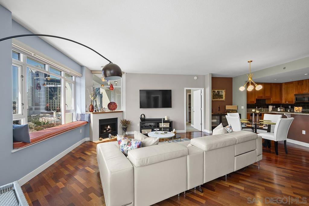 Pristine Park Place Residence with Bay & City Views This 1,233 sq. ft. northwest-facing condo at the prestigious Park Place offers a perfectly designed split two-bedroom floor plan with sweeping views of The residence features a pristine modern chef's kitchen, as well as an expanded island with room for seating, while showcasing the entrancing City and water views that span from Downtown, Coronado, the Bay and beyond to Point Loma. A massive private patio seamlessly extends the living space, creating the ultimate setting for dining, entertaining, or simply enjoying the city lights.The primary bedroom has its own large private patio as well. Park Place residents enjoy resort-style amenities including a pool and spa, fitness center, 24-hour concierge, and secure parking. Ideally located in the Marina District, the property is within a stone’s throw of the waterfront, Seaport Village, The Rady Shell, and downtown’s finest dining and shopping. Pristine Northwest-Facing Residence with Panoramic Views at Park Place with 2 private patios Highly sought after and desirable 1,233 square foot condominium in the prestigious Park Place community offers a refined balance of elegance, comfort, and location. The perfectly designed split two-bedroom floor plan is oriented to maximize both privacy and livability, while showcasing the entrancing City, and Water views that span from Downtown, Coronado, the Bay and beyond to Point Loma. The primary bedroom has its own large private patio. The residence features a pristine, elegantly renovated kitchen, highlighted by an expanded island with room for seating. The seamless flow from kitchen to living space creates an inviting environment for both entertaining and everyday living. A true standout feature is the massive private patio, offering an exceptional extension of the living space. Perfectly positioned to capture the iconic San Diego skyline and coastal breezes, it serves as a rare opportunity for outdoor dining, relaxation, and entertaining. Park Place residents enjoy exclusive access to a collection of luxury amenities, including a resort-style pool and spa, fitness center, 24-hour concierge service, community lounge, and secure parking. Ideally situated in the coveted Marina District, the property is within a stone’s throw of the waterfront, Seaport Village, The Rady Shell, and the city’s finest dining, shopping. This pristine residence presents a rare opportunity to own in one of downtown San Diego’s most distinguished addresses