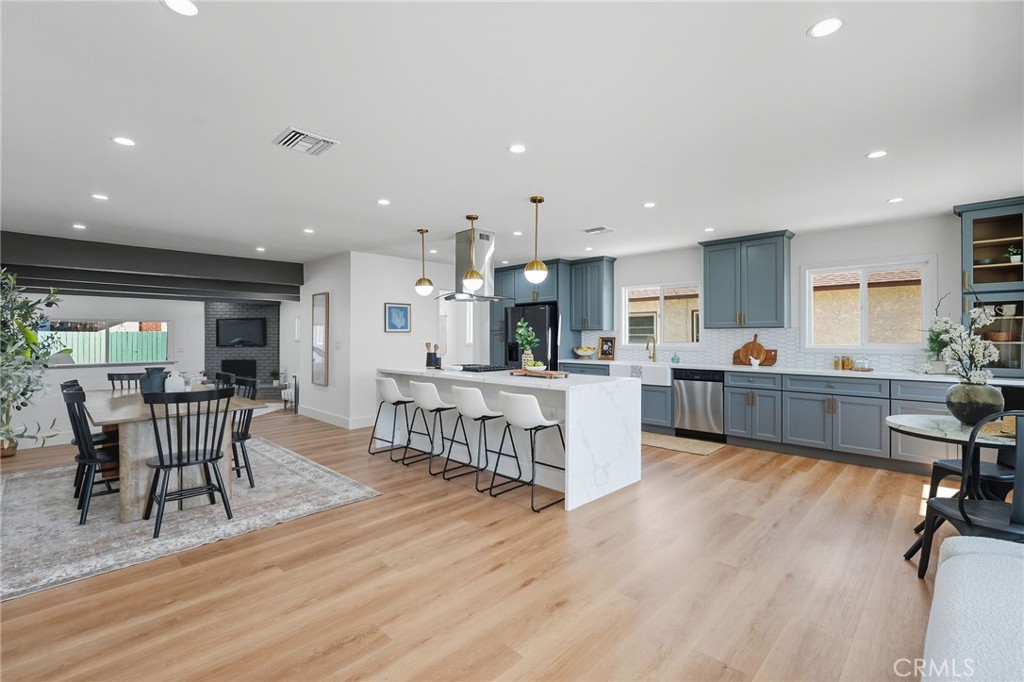Welcome to 5939 Greentop St, a beautifully renovated gem in the heart of Lakewood, CA, specifically in the highly sought after neighborhood of Lakewood Park. Thoughtfully crafted for the most discerning homeowner, this elegant residence offers a seamless blend of modern luxury and timeless comfort. Spanning 1,781 square feet of living space, the home is meticulously designed with 3 spacious bedrooms and 2 luxurious bathrooms, ensuring ample space for relaxation and privacy.
No detail was overlooked in the complete re-imagination of this property. Step into a world of comfort and ease with new plumbing and electrical systems including a brand new 200 AMP electrical panel, ensuring peace of mind and efficiency. The stylish new dual pane windows and luxury vinyl flooring enhance the home's aesthetic, while the custom new kitchen stands as a centerpiece. It features all-new appliances, custom cabinetry, and a massive island with dual quartz water fall edges, perfect for entertaining guests or enjoying family meals. The laundry/mud room, located right next to the kitchen has been equipped with brand new stacked washer and dryer, as well as custom cabinets for additional storage.
The bathrooms are a sanctuary of luxury, adorned with floor-to-ceiling large format tiles, custom tile work, walk-in shower, LED heated mirrors, and brand new vanities. Additional upgrades include a new garage door, updated landscaping, and a tankless water heater. The brand new 4-ton HVAC system promises year-round comfort and upgraded R-30 insulation throughout ensures the home stays cool is the summer months and warm in the winter.
Nestled on a 5,201 square foot lot, this home is surrounded by charming tree-lined streets in a very walkable neighborhood, offering a serene and inviting environment. Enjoy the convenience of being within walking distance to Sprouts, Vons, and a variety of shopping options, as well as the proximity to amazing parks like Heartwell Park and Del Valle Park. This property truly combines modern living with the tranquility of a family-friendly community. Embrace this stunning, fully updated home and its perfect location.