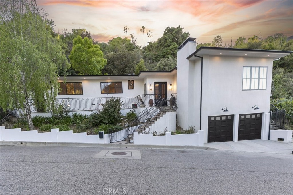 Discover nearly 3,000 square feet of elevated living in one of Sherman Oaks’ most desirable and peaceful hillside communities. This fully upgraded 3-bedroom, 3-bathroom home blends contemporary style with high-end comfort and stunning city views.
The expansive, open-concept layout centers around a modern chef’s kitchen, showcasing a large quartzite island, sleek quartz countertops, custom cabinetry, and a complete set of updated appliances—including a refrigerator, dishwasher, stove/oven with hood, garbage disposal, and in-unit washer and dryer. Brand-new wood laminate flooring flows throughout the home, complemented by recessed lighting and large new windows and doors that bring in abundant natural light. Each bathroom is thoughtfully finished with natural stone, designer vanities, and stylish fixtures that elevate the overall aesthetic. The spacious primary suite features a walk-in closet and a private ensuite bathroom with luxurious finishes.
A flexible bonus room provides additional space for work or hobbies, while a dedicated game room—with a pool table and included games—offers an extra layer of leisure and entertainment. Outside, enjoy two balconies offering panoramic city views, a built-in BBQ perfect for outdoor dining, and a private spa, professionally maintained by the landlord. Additional property highlights include: Two brand-new A/C units with Nest thermostats, a new furnace, a new roof, a Bluetooth-enabled garage doors, two decorative water fountains, optional installation of wireless alarm cameras, landscaping service is included; tenant is responsible for utilities. With its premium upgrades, modern amenities, and serene hilltop location, this exceptional home offers a rare lease opportunity in the heart of Sherman Oaks.
