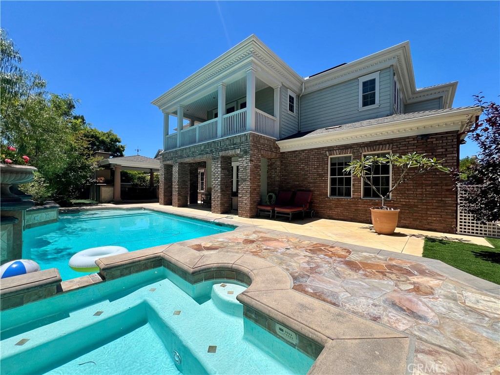 Rare opportunity to own one of the largest and most luxurious homes in the prestigious gated community of Covenant Hills. This semi-custom Colonial estate in the Skye Isle Collection boasts 5,797 sq ft of refined living space plus 785 sq ft of finished 4-car tandem garage. True 6-bedroom layout with separate office .
Designer details throughout: grand spiral staircase, 10-ft ceilings on main level, 9-ft upstairs, solid oak hardwood floors, crystal chandeliers, solid-core doors, and extensive millwork. Gourmet kitchen features Wolf & Sub-Zero appliances, oversized island, Sub-Zero wine fridge, and dual Café dishwashers. Expansive great room, formal dining & living rooms, skylights, and master suite with lounge and sunset views.
Backyard resort includes pool with waterfalls, 12-person spa, covered outdoor kitchen with 54” Lynx grill, fireplace, artificial turf, and lush landscaping. Paid solar, epoxy-coated copper plumbing (2022), 2 newer HVACs, new water heater, and surround sound.
Enjoy 24/7 security, pools, splash park, tennis, skate park, trails, and top-rated schools. This is luxury living at its best. Shown by appointment only.