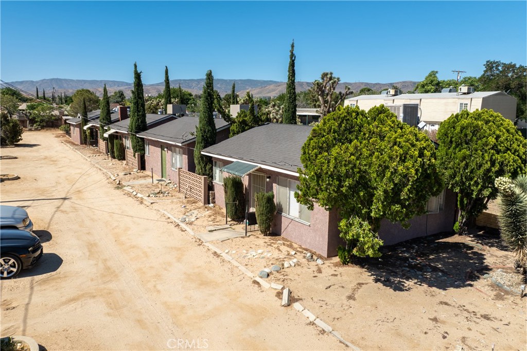 Fantastic opportunity to own a well-maintained 4-unit income-producing property on a generous 0.5-acre lot in the heart of Lancaster. The property features a desirable unit mix, consisting of one spacious 2-bedroom, 1.5-bathroom unit and three 1-bedroom, 1-bathroom units—perfect for steady rental income and long-term tenant stability. Recent upgrades include a brand-new roof (2024) and updated main line plumbing upgrades, significantly reducing future maintenance expenses and adding long-term value. Each unit is separately metered for electricity and gas, offering added efficiency and control for both tenants and owner.
Centrally located near major shopping centers, schools, public transit, and parks, the property provides convenience and appeal to prospective renters. The expansive half-acre lot also presents potential for additional amenities, expanded parking, or possible future development with R-3 zoning (buyer to verify with city). With its strong fundamentals, recent improvements, and excellent location, this turnkey asset is a solid investment opportunity for both seasoned investors and those entering the multifamily space.